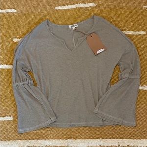 Listicle bell sleeved top